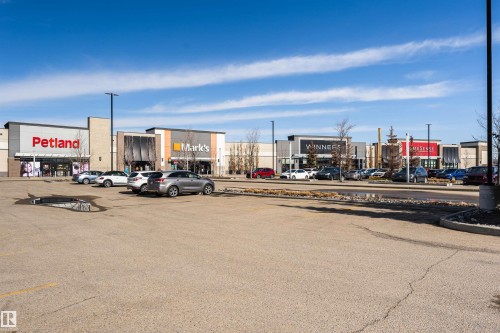 View of uncovered parking lot - 332 5151 Windermere Boulevard, Edmonton, AB - Outdoor
