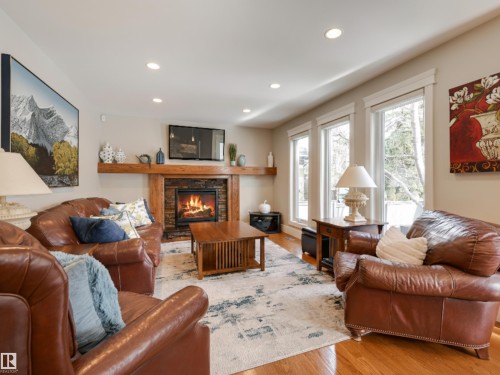 10997 131 Street, Edmonton, AB - Indoor Photo Showing Living Room With Fireplace