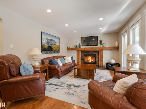 10997 131 Street, Edmonton, AB - Indoor Photo Showing Living Room With Fireplace