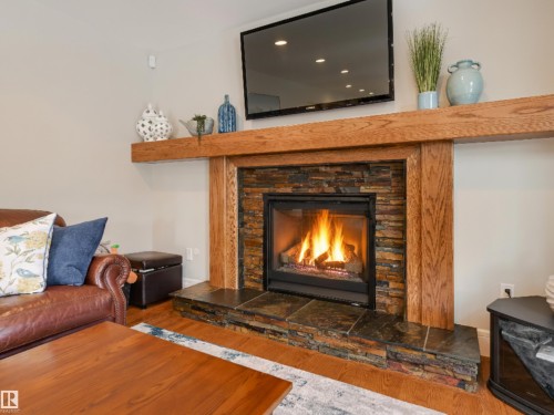 10997 131 Street, Edmonton, AB - Indoor Photo Showing Living Room With Fireplace
