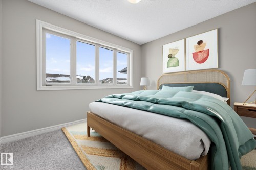 Bedroom with carpet and a textured ceiling - 2435 Austin Crescent, Edmonton, AB - Indoor Photo Showing Bedroom