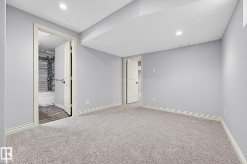 Finished basement featuring carpet flooring and recessed lighting - 2435 Austin Crescent, Edmonton, AB - Indoor Photo Showing Other Room