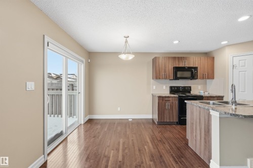 6833 Cardinal Link, Edmonton, AB - Indoor Photo Showing Kitchen With Double Sink