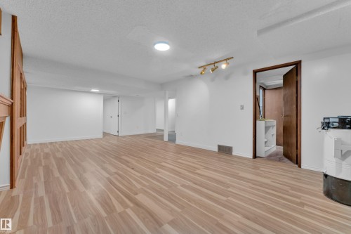 Snowy aerial view with a residential view - 5504 18 Avenue, Edmonton, AB - Outdoor With View