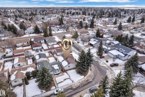Snowy aerial view with a residential view - 5504 18 Avenue, Edmonton, AB - Outdoor With View