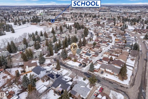 Snowy aerial view with a residential view - 5504 18 Avenue, Edmonton, AB - Outdoor With View