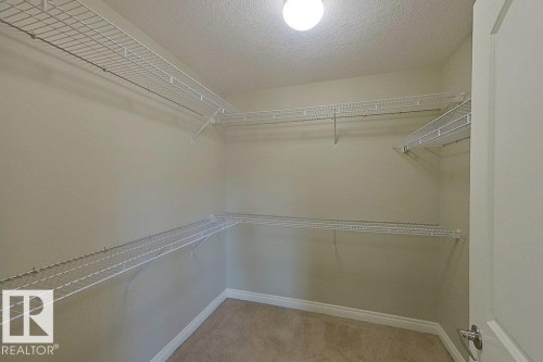 10 903 Rutherford Road Sw, Edmonton, AB - Indoor With Storage