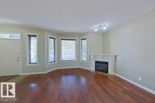 10 903 Rutherford Road Sw, Edmonton, AB - Indoor With Fireplace