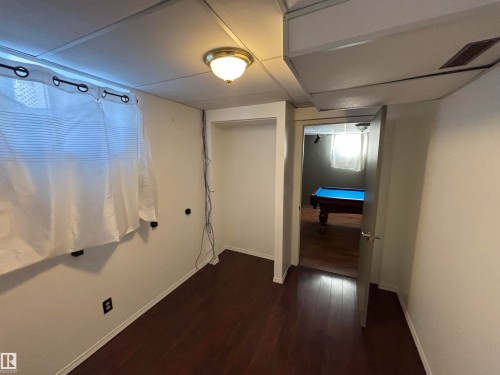 Basement Bedroom - 12303 131 Street Nw, Edmonton, AB - Indoor Photo Showing Other Room