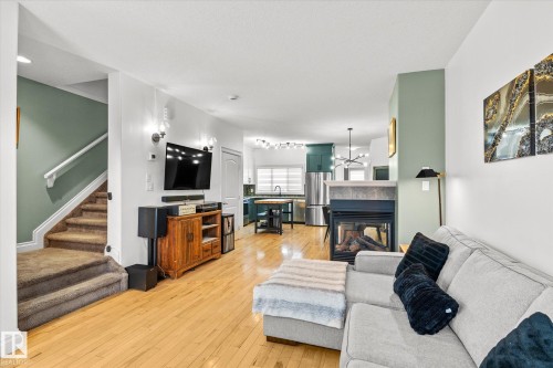 4929 Terwillegar Common, Edmonton, AB - Indoor Photo Showing Living Room With Fireplace