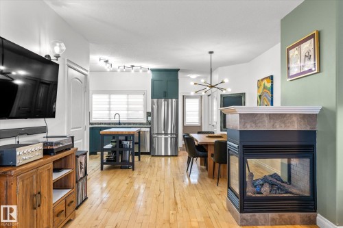 4929 Terwillegar Common, Edmonton, AB - Indoor With Fireplace