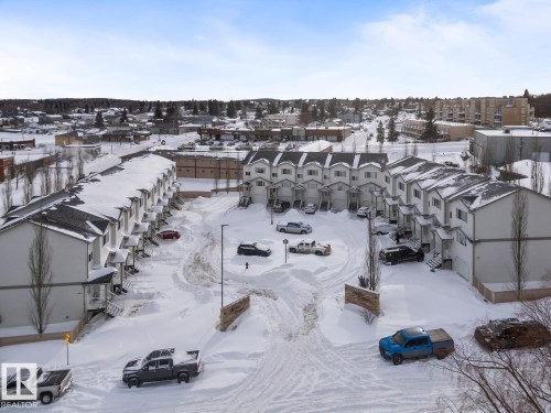 Snowy aerial view featuring a residential view - 7 1001 7 Avenue, Cold Lake, AB - Outdoor