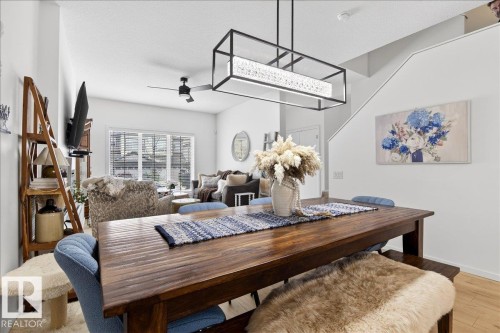Dining area featuring light wood finished floors and a ceiling fan - 6609 47 Avenue, Beaumont, AB - Indoor Photo Showing Other Room