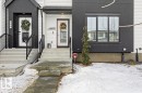 View of snow covered property entrance - 6609 47 Avenue, Beaumont, AB  - Outdoor 