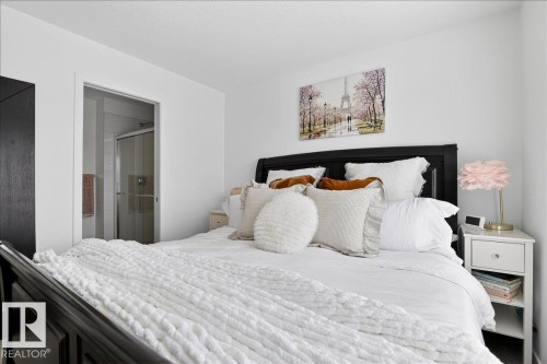Bedroom with ensuite bathroom - 6609 47 Avenue, Beaumont, AB - Indoor Photo Showing Bedroom