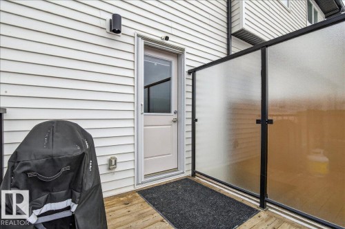 Doorway to property - 6609 47 Avenue, Beaumont, AB - Outdoor With Exterior