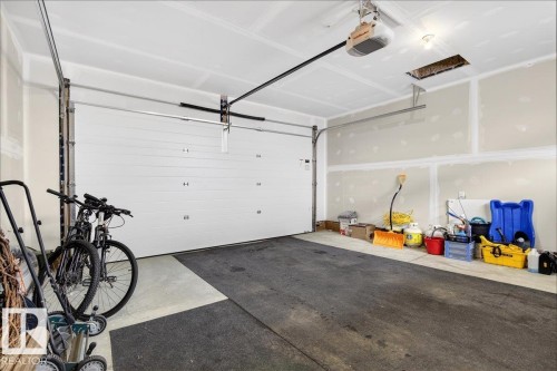 Garage with a garage door opener - 6609 47 Avenue, Beaumont, AB - Indoor Photo Showing Garage