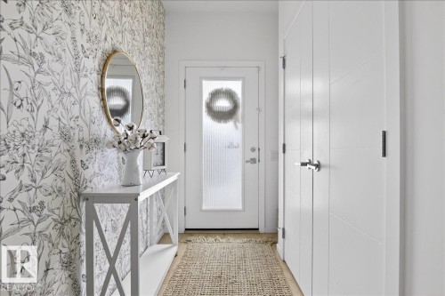 View of doorway - 6609 47 Avenue, Beaumont, AB - Indoor Photo Showing Other Room