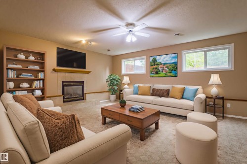 3835 47 Street, Edmonton, AB - Indoor Photo Showing Living Room With Fireplace