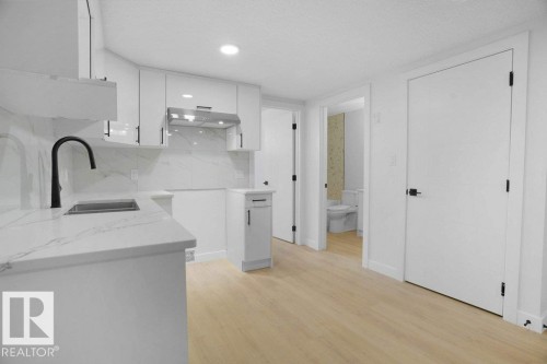 10946 62 Avenue, Edmonton, AB - Indoor Photo Showing Kitchen With Double Sink