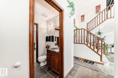 Bathroom with toilet and vanity - 777 Butterworth Drive, Edmonton, AB - Indoor Photo Showing Other Room
