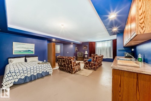 Bedroom featuring concrete floors and recessed lighting - 777 Butterworth Drive, Edmonton, AB - Indoor Photo Showing Bedroom