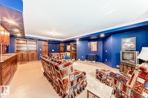 Living area featuring light colored carpet - 777 Butterworth Drive, Edmonton, AB - Indoor