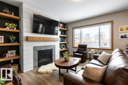19 Riviere Terrace, St. Albert, AB - Indoor Photo Showing Living Room With Fireplace