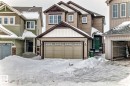 Craftsman-style house featuring board and batten siding and a garage - 2823 Duke Crescent, Edmonton, AB  - Outdoor With Facade 