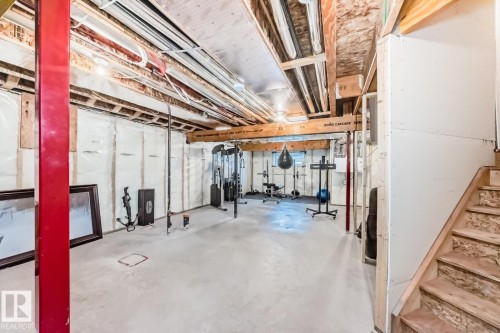 Unfinished below grade area with stairs - 2823 Duke Crescent, Edmonton, AB - Indoor Photo Showing Basement