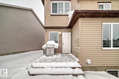 View of snow covered property entrance - 2823 Duke Crescent, Edmonton, AB - Outdoor With Exterior