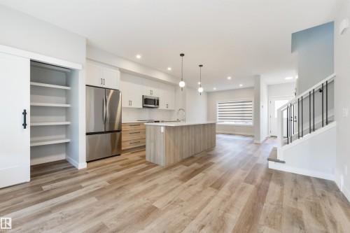 8311 & 8313 76 Avenue, Edmonton, AB - Indoor Photo Showing Kitchen With Upgraded Kitchen