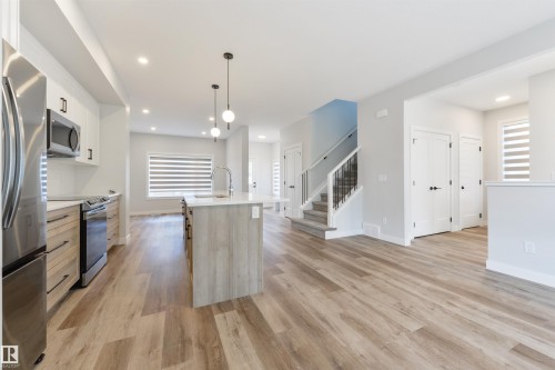 8311 & 8313 76 Avenue, Edmonton, AB - Indoor Photo Showing Kitchen With Upgraded Kitchen