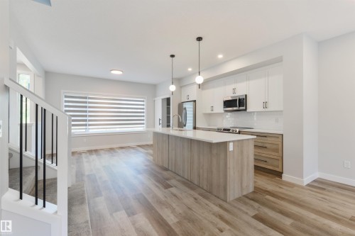 8311 & 8313 76 Avenue, Edmonton, AB - Indoor Photo Showing Kitchen With Upgraded Kitchen