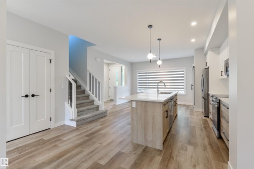 8311 & 8313 76 Avenue, Edmonton, AB - Indoor Photo Showing Kitchen