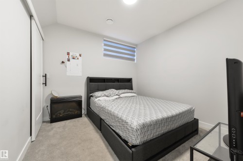 8311 & 8313 76 Avenue, Edmonton, AB - Indoor Photo Showing Bedroom