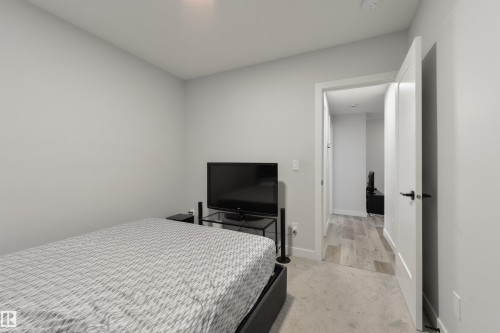 8311 & 8313 76 Avenue, Edmonton, AB - Indoor Photo Showing Bedroom