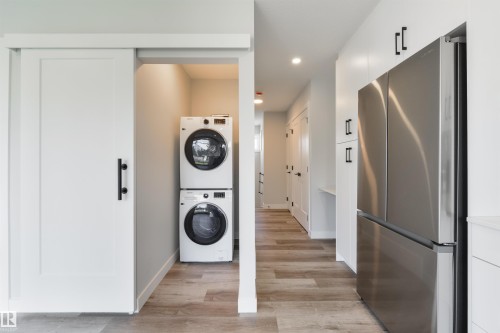 8311 & 8313 76 Avenue, Edmonton, AB - Indoor Photo Showing Laundry Room