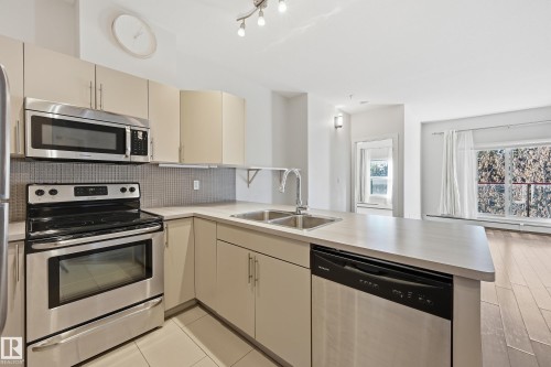 315 10611 117 Street, Edmonton, AB - Indoor Photo Showing Kitchen With Stainless Steel Kitchen With Double Sink With Upgraded Kitchen