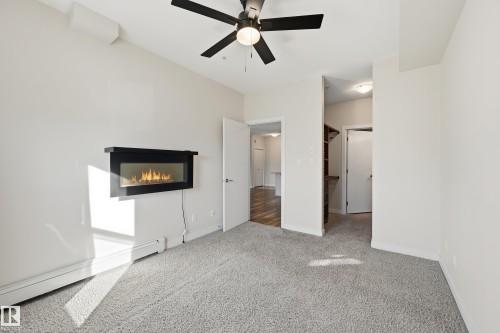315 10611 117 Street, Edmonton, AB - Indoor With Fireplace