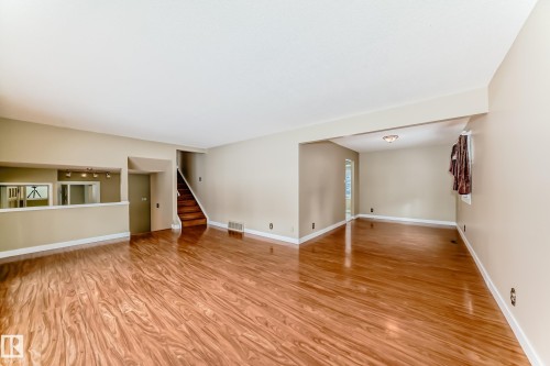 Unfurnished living room featuring light wood finished floors - 38 Lancaster Crescent, St. Albert, AB - Indoor Photo Showing Other Room