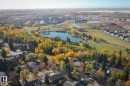 Aerial view of property and surrounding area with nearby suburban area and a nearby body of water - 38 Lancaster Crescent, St. Albert, AB  - Outdoor With View 