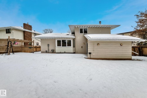 Snow covered house with a patio - 38 Lancaster Crescent, St. Albert, AB - Outdoor With Deck Patio Veranda With Exterior