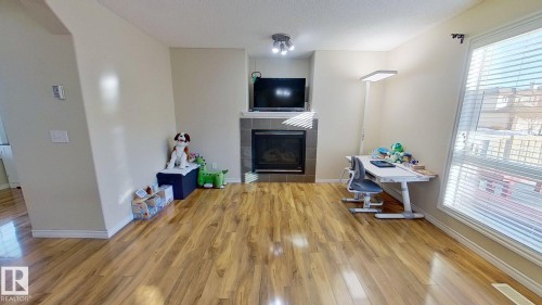 7376 Singer Way, Edmonton, AB - Indoor With Fireplace