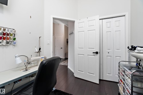 Home office featuring dark wood-style floors - 302 10905 109 Street, Edmonton, AB - Indoor Photo Showing Office