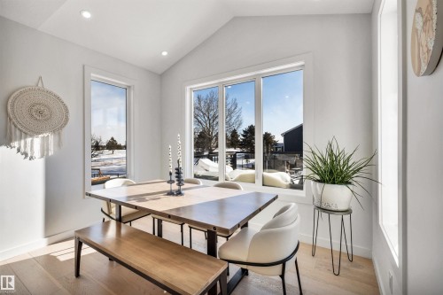 Dining space featuring light wood-style flooring and recessed lighting - 11 Promenade Point(E), Beaumont, AB - Indoor Photo Showing Other Room
