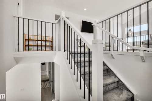 View of staircase - 11 Promenade Point(E), Beaumont, AB - Indoor Photo Showing Other Room