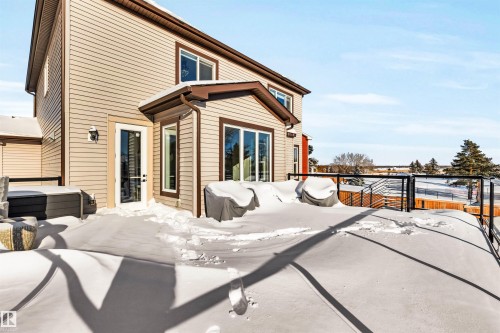 View of snow covered deck - 11 Promenade Point(E), Beaumont, AB - Outdoor