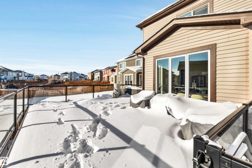 View of patio / terrace with a residential view - 11 Promenade Point(E), Beaumont, AB - Outdoor