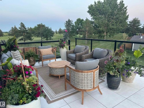 View of patio featuring an outdoor living space - 11 Promenade Point(E), Beaumont, AB - Outdoor With Deck Patio Veranda